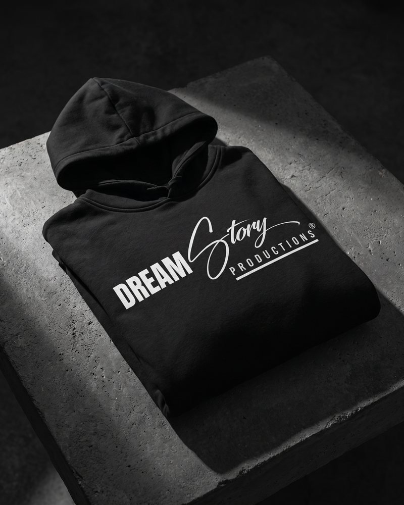 Mockup of the Dream Story Productions logo printed in white on a black hoodie